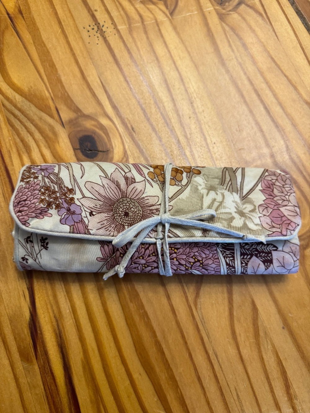 Vintage 1960’s or 1970’s floral motif roll up jewelry bag